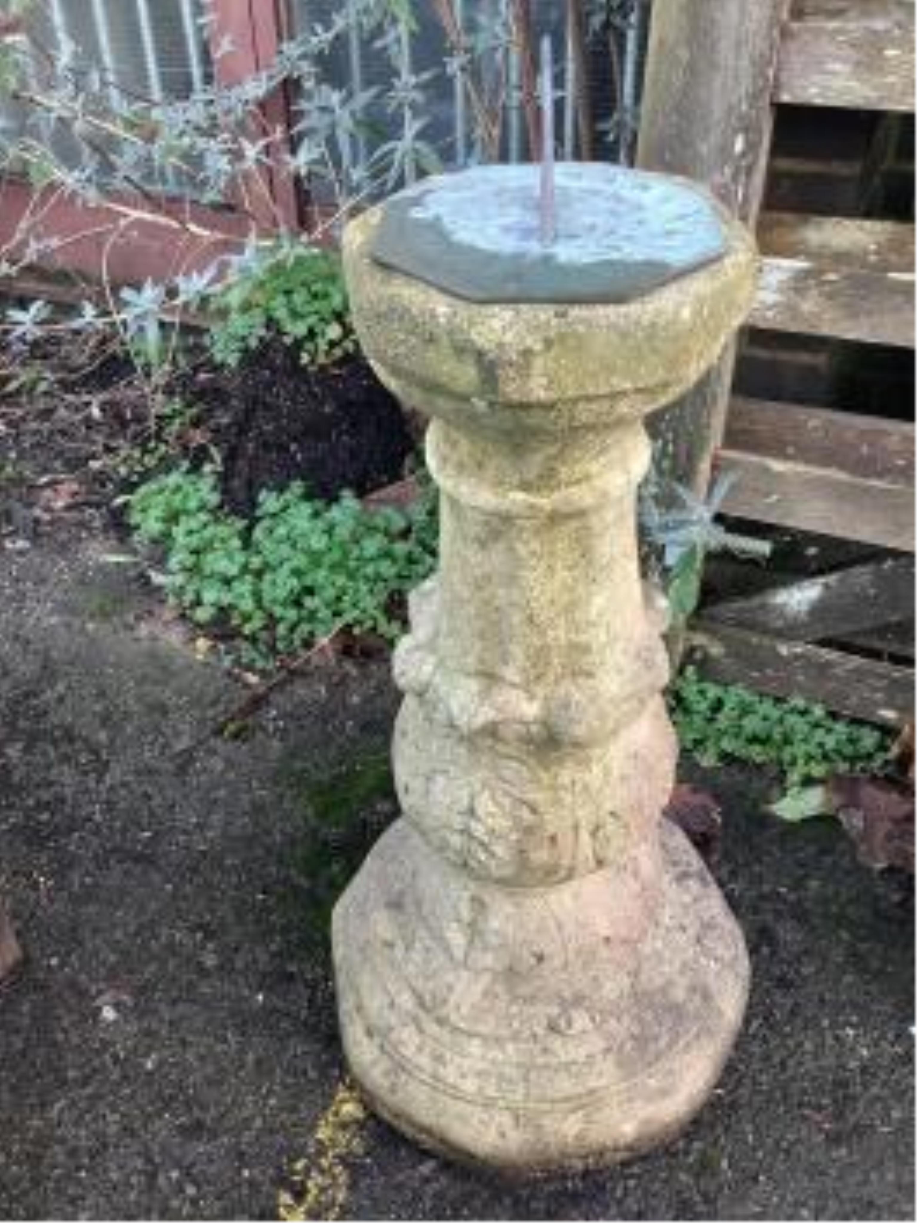 Three reconstituted stone garden planters, largest height 54cm and a reconstituted stone sundial, with bronze dial and gnomon, height 86cm. Condition - fair